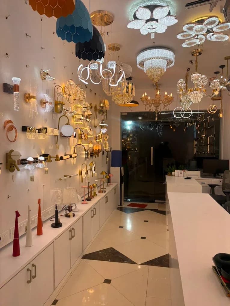 Wall light gallery running the length of the showroom
